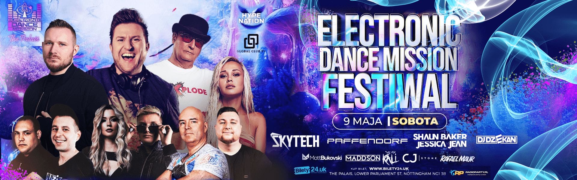 Chris standing up holding his daughter Elva